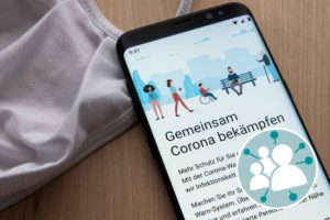 Smartphone Display mit dem Text: Gemeinsam Corona bekämpfen